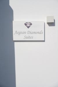 a sign for the argentinian diamonds suites at Aegean Diamonds Luxury Suites in Monolithos