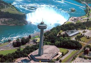 an aerial view of a waterfall and a control tower at New Luxury Suite 6Mins To Falls, Free Parking in Niagara Falls