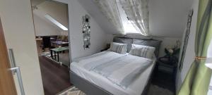 Postel nebo postele na pokoji v ubytování Ferienhaus Erika