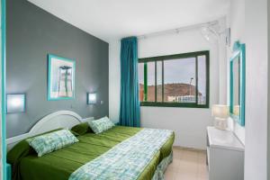 Giường trong phòng chung tại Casa Los Veleros F2 +17 ảnh