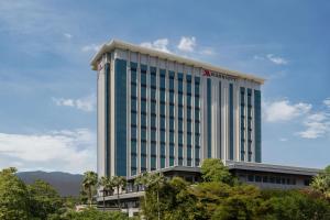 a tall building with a amazon sign on it at Chiang Mai Marriott Hotel in Chiang Mai