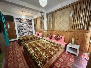 Postel nebo postele na pokoji v ubytování Jessica Homestay, Darjeeling