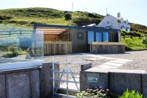 a house on the side of a hill at Doolin Inn in Doolin