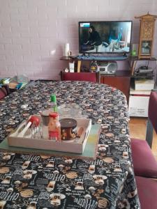 a table with a tray of food on top of it at Un lugar Para Tu Relax in Quillota