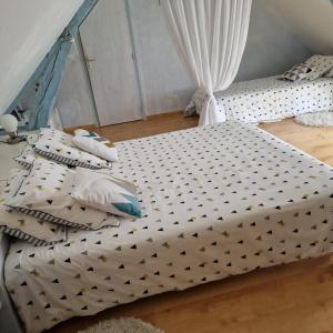 Postel nebo postele na pokoji v ubytování Maison d'Hôtes La Quèrière