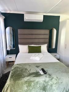 En eller flere senge i et værelse på The Legacy Airbnb