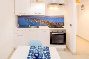 Gallery image of Virgilius Living Apartments in Sirmione +5 photos