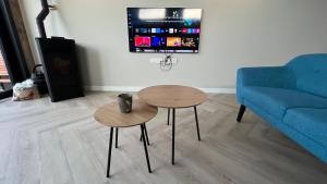 TV a/nebo společenská místnost v ubytování Studio Lakeview