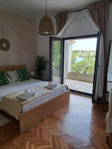 Postel nebo postele na pokoji v ubytování Guesthouse Tamara