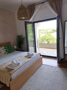 Postel nebo postele na pokoji v ubytování Guesthouse Tamara