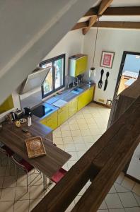 an overhead view of a kitchen in a house at Villa K'nell - La Possession in La Possession