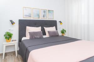 Postel nebo postele na pokoji v ubytování Palm Beach Fuerteventura