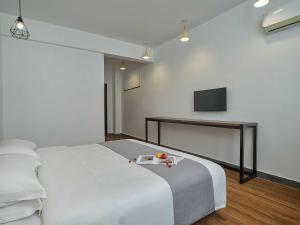 Postel nebo postele na pokoji v ubytování Zhangjiajie Yeah Hostel