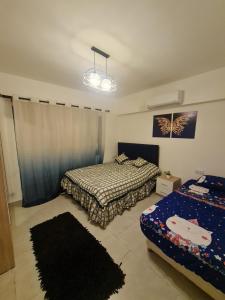 Postel nebo postele na pokoji v ubytování مراسى الساحل الشمالى + 10 fotografií
