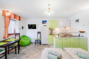Kuchyň nebo kuchyňský kout v ubytování Apartment Bruna Vučič