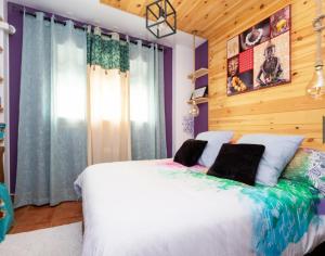 Postel nebo postele na pokoji v ubytování Casita del Barranco lunar