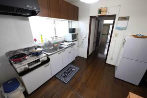 Kuchyň nebo kuchyňský kout v ubytování Karwan House
