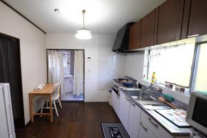 Kuchyň nebo kuchyňský kout v ubytování Karwan House
