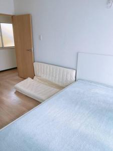 Postel nebo postele na pokoji v ubytování Karwan House