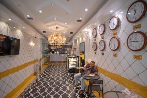 TV a/nebo společenská místnost v ubytování AL KARNAK HOTEL - BRANCH