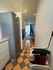 A cozinha ou cozinha compacta de Appartement cosy, Bois de Vincennes-porte de Paris