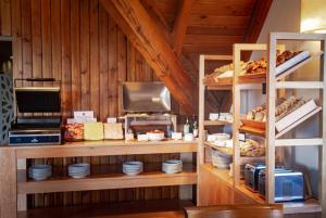 A cozinha ou cozinha compacta de Mirador del Lago Hotel
