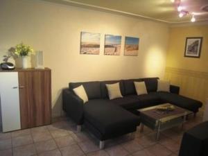 Fotografie z fotogalerie ubytování Großzügige Ferienwohnung mit Privatgarten im Nordseebad Carolinensiel v destinaci Wittmund