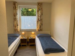 Fotografie z fotogalerie ubytování Großzügige Ferienwohnung mit Privatgarten im Nordseebad Carolinensiel v destinaci Wittmund