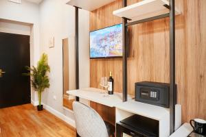 TV a/nebo společenská místnost v ubytování Hotel Brooklyn - ex Hotel Lombardi