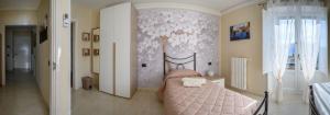 Postel nebo postele na pokoji v ubytování B&B Miraville