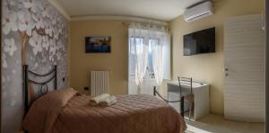 Postel nebo postele na pokoji v ubytování B&B Miraville