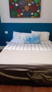Ένα ή περισσότερα κρεβάτια σε δωμάτιο στο Nuovo appartamento in borgo medievale