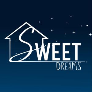 a sign for the word street dreams with a house at Sweet Dreams Polokwane in Polokwane