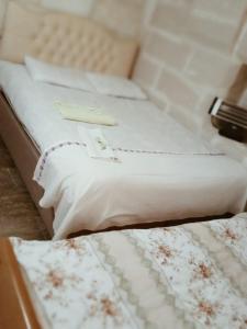 Säng eller sängar i ett rum på ULAŞ CAVE HOTEL