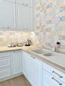 Kuchyň nebo kuchyňský kout v ubytování Éllő Residence