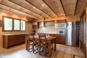 Kuchyň nebo kuchyňský kout v ubytování Ferienhaus für 12 Personen ca 400 m in Son Macià, Balearen Mallorca + 14 fotografií
