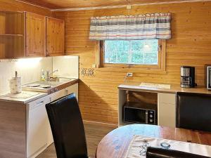 Η κουζίνα ή μικρή κουζίνα στο 4 person holiday home in Lysøysundet +16 φωτογραφίες