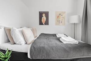 Katil atau katil-katil dalam bilik di Peaceful studio apartment