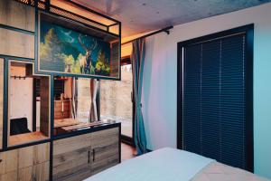 Katil atau katil-katil dalam bilik di Pasul Palma Village-Mirror House