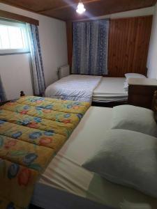 Postel nebo postele na pokoji v ubytování chalet au calme