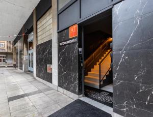 an entrance to a building with a stairway at Old Town Apartments by Staynnapartments in Bilbao