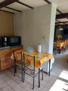 Kuchyň nebo kuchyňský kout v ubytování chalet au calme