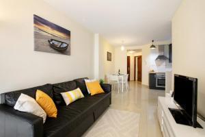 Μια τηλεόραση ή/και κέντρο ψυχαγωγίας στο Apartamento Leonor San Andrés