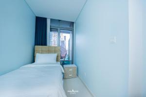 Una cama o camas en una habitación de Paramount Midtown Hotel, Burj Khalifa Views