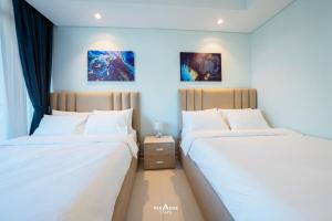 Una cama o camas en una habitación de Paramount Midtown Hotel, Burj Khalifa Views