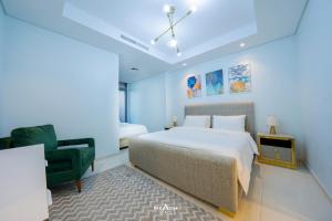 Una cama o camas en una habitación de Paramount Midtown Hotel, Burj Khalifa Views 37 fotos más