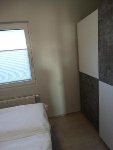 Postel nebo postele na pokoji v ubytování Schönes Ferienhaus in Wervershoof mit Garten, Grill und Terrasse + 14 fotografií