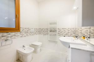 Kylpyhuone majoituspaikassa Angelico Comfort Apartament