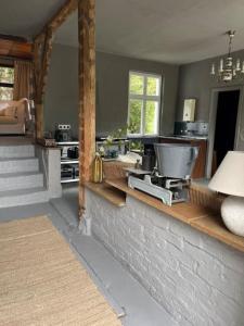 Kuchyň nebo kuchyňský kout v ubytování Lakeside Studio – Haus mit Seezugang + 28 fotografií