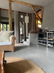 Posezení v ubytování Lakeside Studio – Haus mit Seezugang